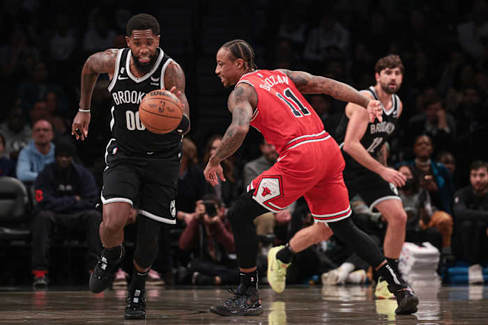 Bulls forward DeMar DeRozan attempts to stop a Nets fast break.